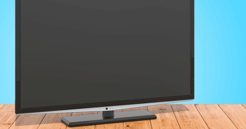木製の台に置かれたスタンド付きの薄型テレビ